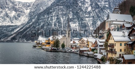 Scenic picture-postcard view of famous Hallstatt mountain village in the Austrian Alps at beautiful light in winter, Salzkammergut region, Hallstatt, Austria.