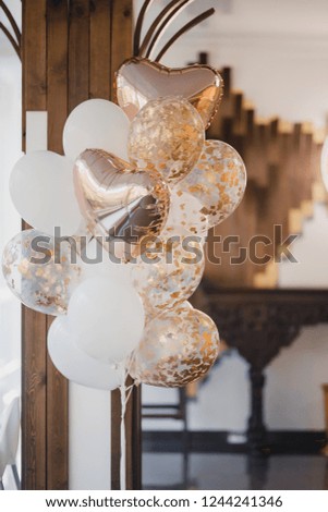 white and golden balloons