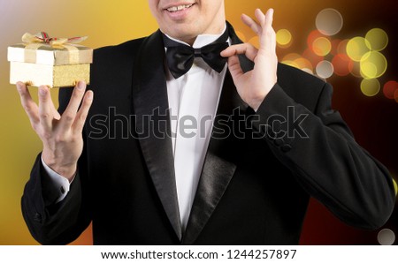 man in tuxedo and holiday