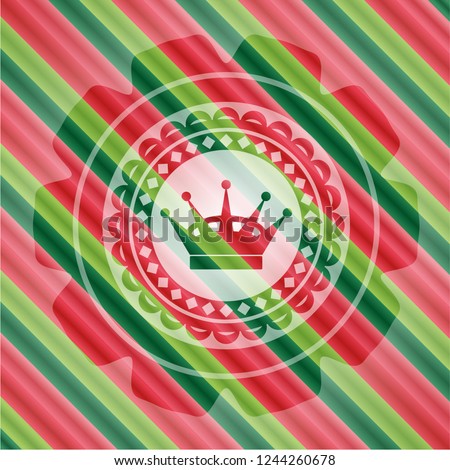 queen crown icon inside christmas colors style emblem.