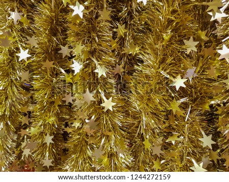 Make it Delightful Christmas ornament with Elegance Thick Chunky Wide Gold Shiny Christmas Tree Tinsel Garland with Embossing Decoration with Christmas Day or Merry Christmas.