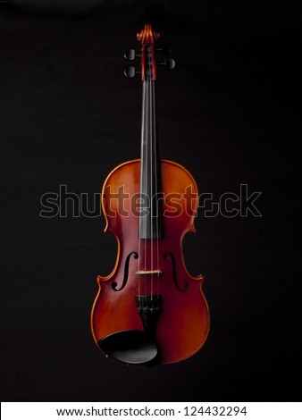 Classical violin isolated in a black background