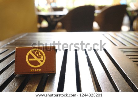 Leather labels shown signs at the stop smoking.