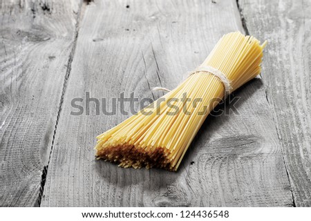 Spaghetti on an old and vintage wooden table