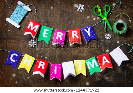 Merry Christmas background and decorations on rustic background.