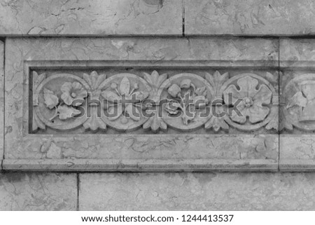 Black and white photos, elements of architectural decorations of buildings on the streets in Catalonia, public places.