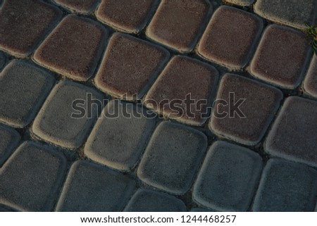 Paving stones. Concept of laying paving slabs and pavers. Paving stones. Concrete pavement blocks