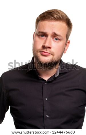 Young man wearing black shirt over isolated background thinking about question, pensive expression.