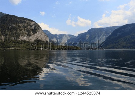 Beautiful landscape of Hallstatt mountain village with Hallstatter lake in Austrian Alps natural color.