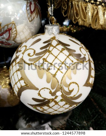 2019. Christmas balls with pictures in the basket. Balls to decorate the tree. Design. Background