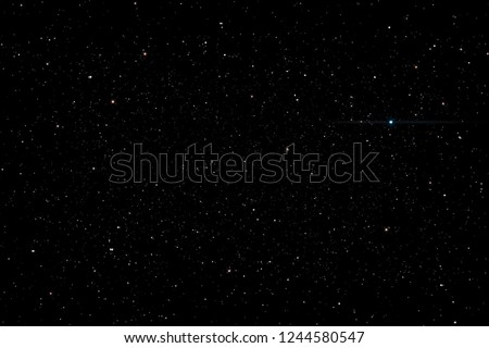 Stars in the night sky background texture milky way glow of stars. The sky is in the stars. Royalty-Free Stock Photo #1244580547