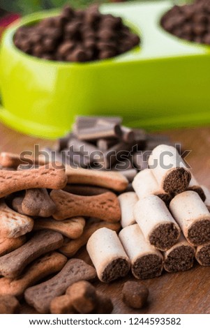 Dog food on wooden background