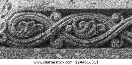Black and white photos, elements of architectural decorations of buildings, bas-reliefs and patterns on the streets in Catalonia, public places.