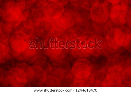 Abstract background colorful blurred bokeh of light moving around from a light led footage in night garden party tunnel pattern for christmas and new year background.