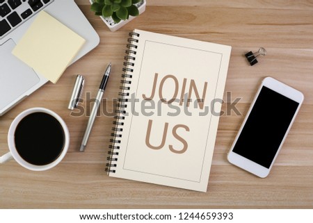Join Us, the phrase is on office table desktop background. Business concept, strategy, plan, planning.