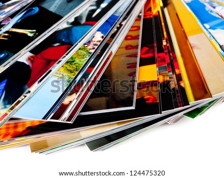 Stack of the photos, isolated on a white background.
