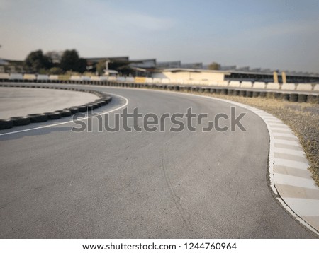 Picture with background of racing track