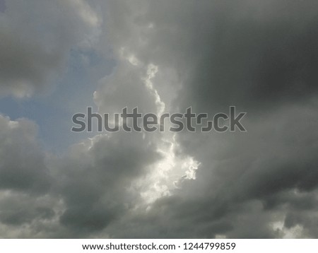 Black clouds​ background.Dark sky because of rain clouds.