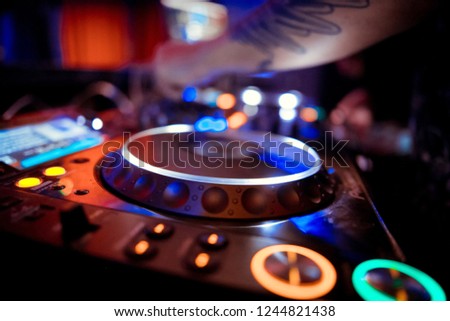 Dj playing disco house progressive electro music at the concert