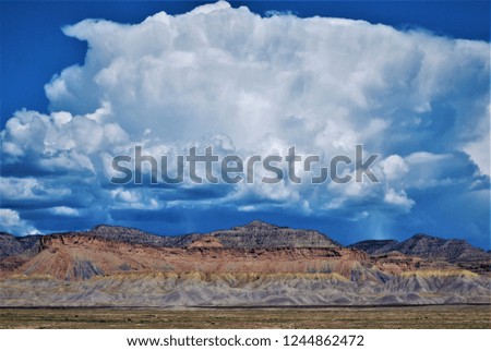 Storm system over desert mountains