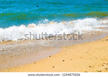 sea waves hits to beach sands. tourism theme for banner.