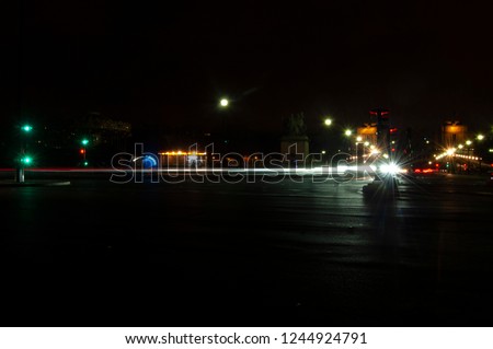 Cars moving long exposure traffic on Paris roads at night