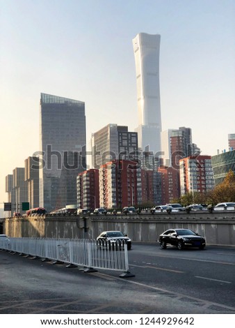 city road through modern buildings in beijing