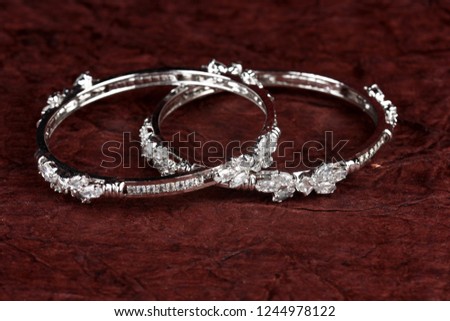 Diamond bracelet on textured background, diamond jewellery, diamond bangles,diamond jewelry