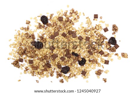 Crunchy granola, muesli with chocolate and cherry pieces isolated on white background, top view