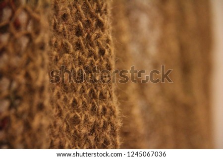 Texture of the brown net, brown color background, woven hemp rope texture. 