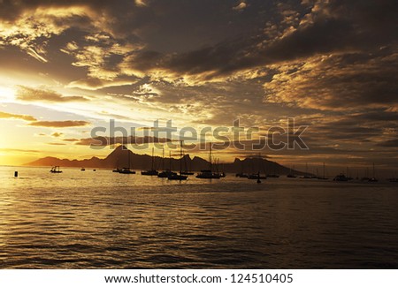 Morea island view from the sea at sunset - French Polinesia