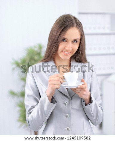 successful business woman with a Cup of coffee