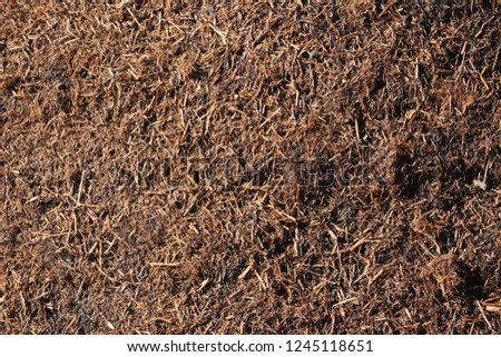 Raw compost tea manure; excellent, nutrient-rich organic fertilizer and soil conditioner. It is used in farming and small scale sustainable,organic farm / artvin / turkey  Royalty-Free Stock Photo #1245118651