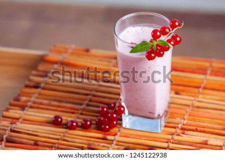 Redcurrant smoothie with mint, organic drink for people on a diet. Cool summer beverage for berries.