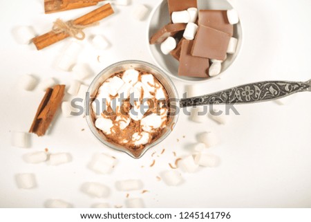 drink hot chocolate and marshmallow marshmallow nearby is attributes