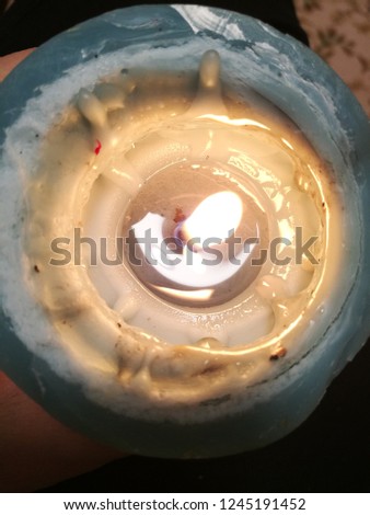 Candle Burning fire Flame indoors heat temperature natural phenomenon high angle view illuminated close-up Nature Royalty-Free Stock Photo #1245191452