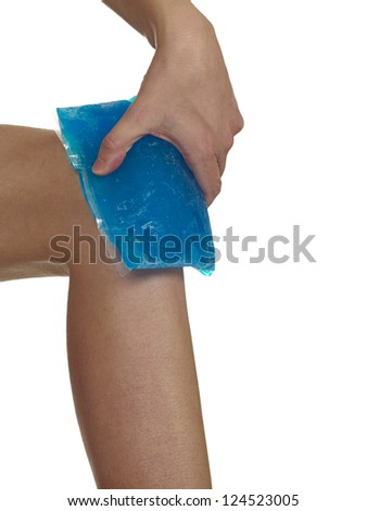 Female holding ice gel pack on knee. Medical concept photo. Isolation on a white background.