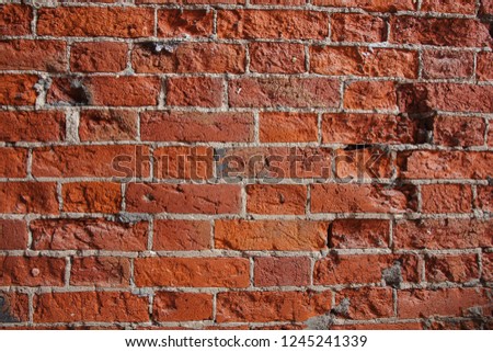 Old red brick wall texture grunge background. Мay use to interior design