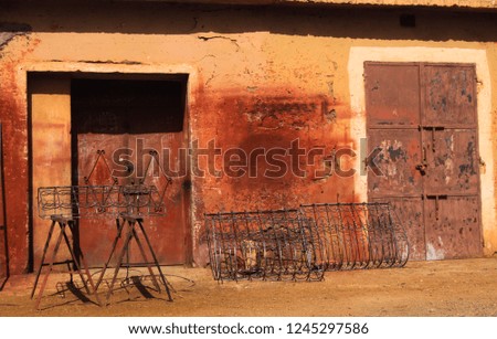 Front of abandoned berber arabian house in atlas mountains near Ourika valley, Morocco