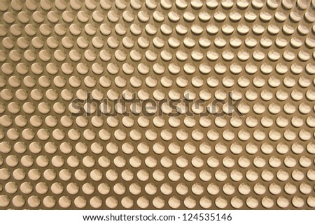 golden metal plate with round texture background
