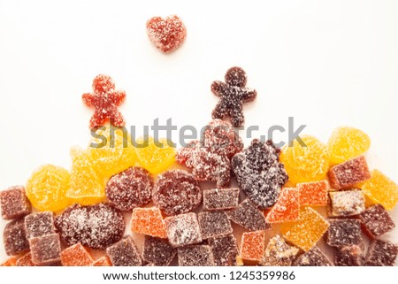 colorful fruit jelly candy on white backdrop