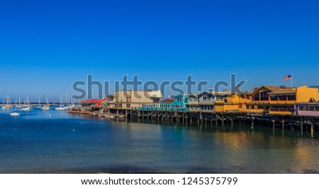 The Old Fisherman's Wharf in Monterey, California, a famous tourist attraction Royalty-Free Stock Photo #1245375799