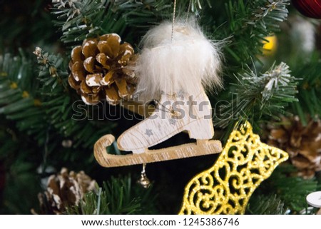 Christmas tree unusual decoration skates background
