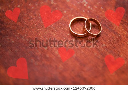 Valentines day backround with hearts and love on a wood texture. toned