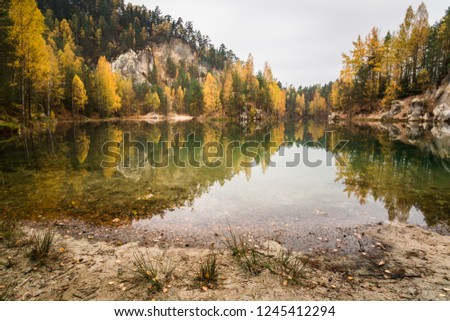 A lake with clean water between the rocks. autumn, Adrspach, Czech Republic