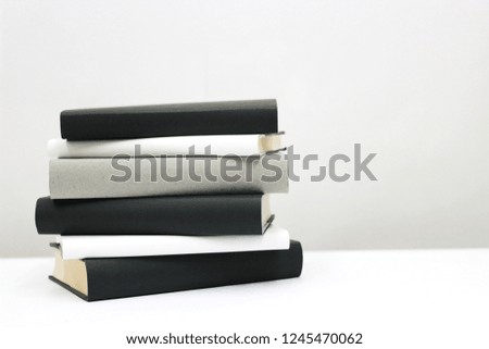 Stack of books on white