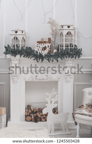 white pure fireplace, christmass tree brunches on  the fireplace, white room, frosted filter, matt, wooden lamps