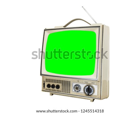 Worn vintage portable television isolated on white with chroma green screen.