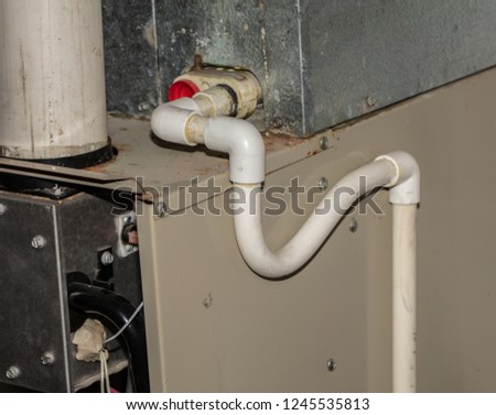 drainage lines from your furnace Royalty-Free Stock Photo #1245535813