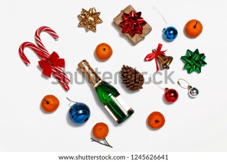 christmas items with champagne isolated on white background